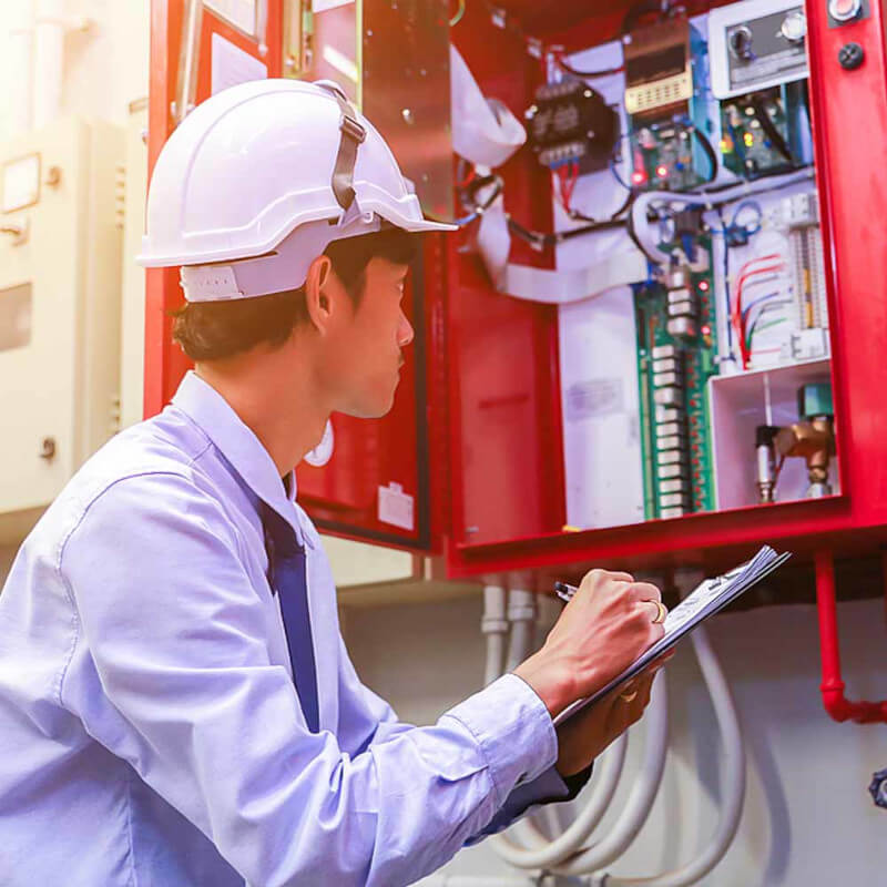 An engineer inspecting fire safety systems.