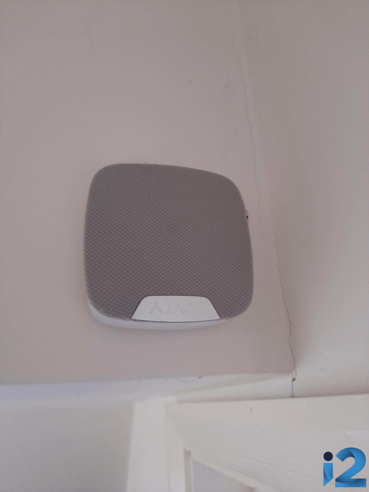 Ajax HomeSiren installed in a UK home.