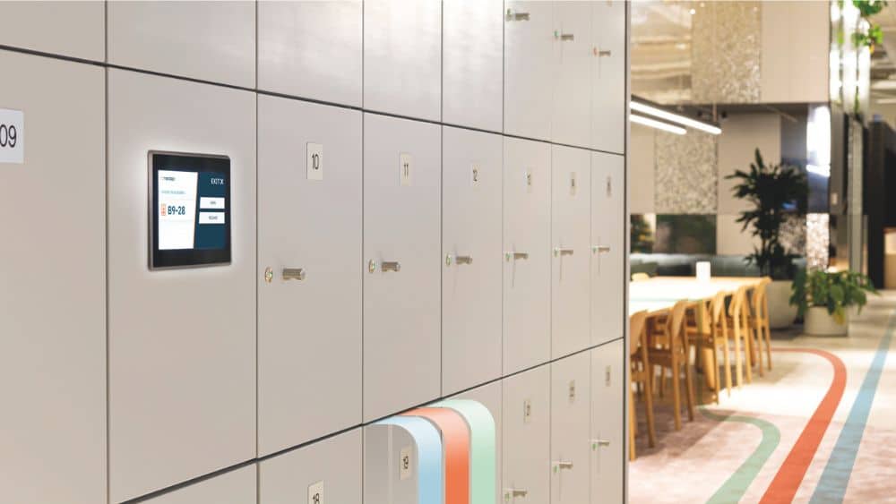 Nedap access control locker management showing workplace lockers with an AEOS screen for secure storage.